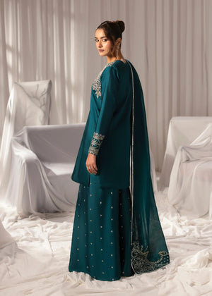 Model wearing dark green Jamnii 3 piece suit online from Buraq Store