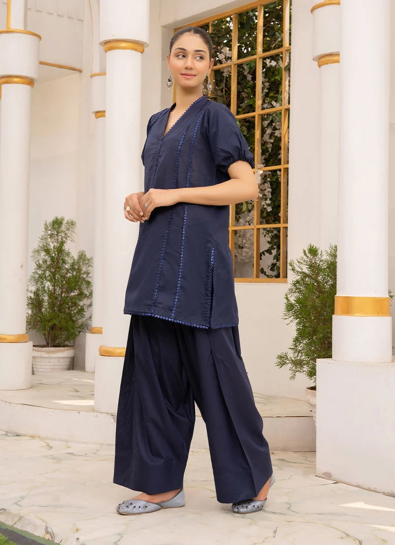 Women wearing navy blue color dress, close-up of the dori and lace detail on the cotton top, Buraqstore