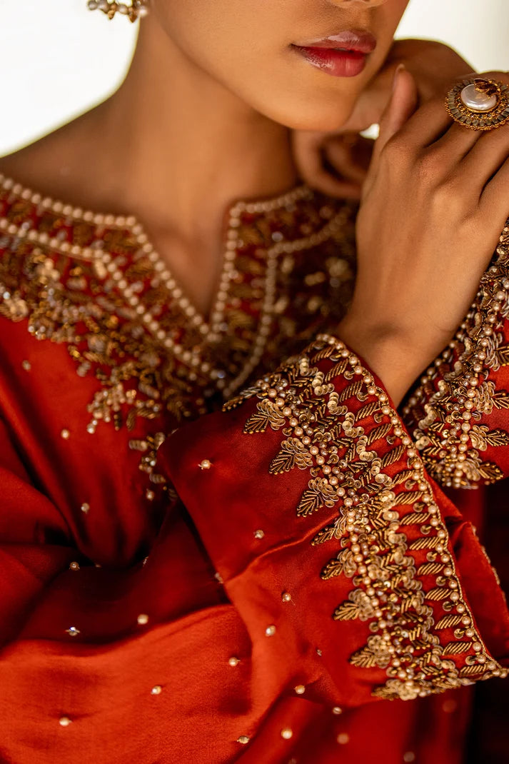 Women wearing deep rust kaftan dress price in pakistan set, side view of the relaxed sheesha silk fit at Buraqstore