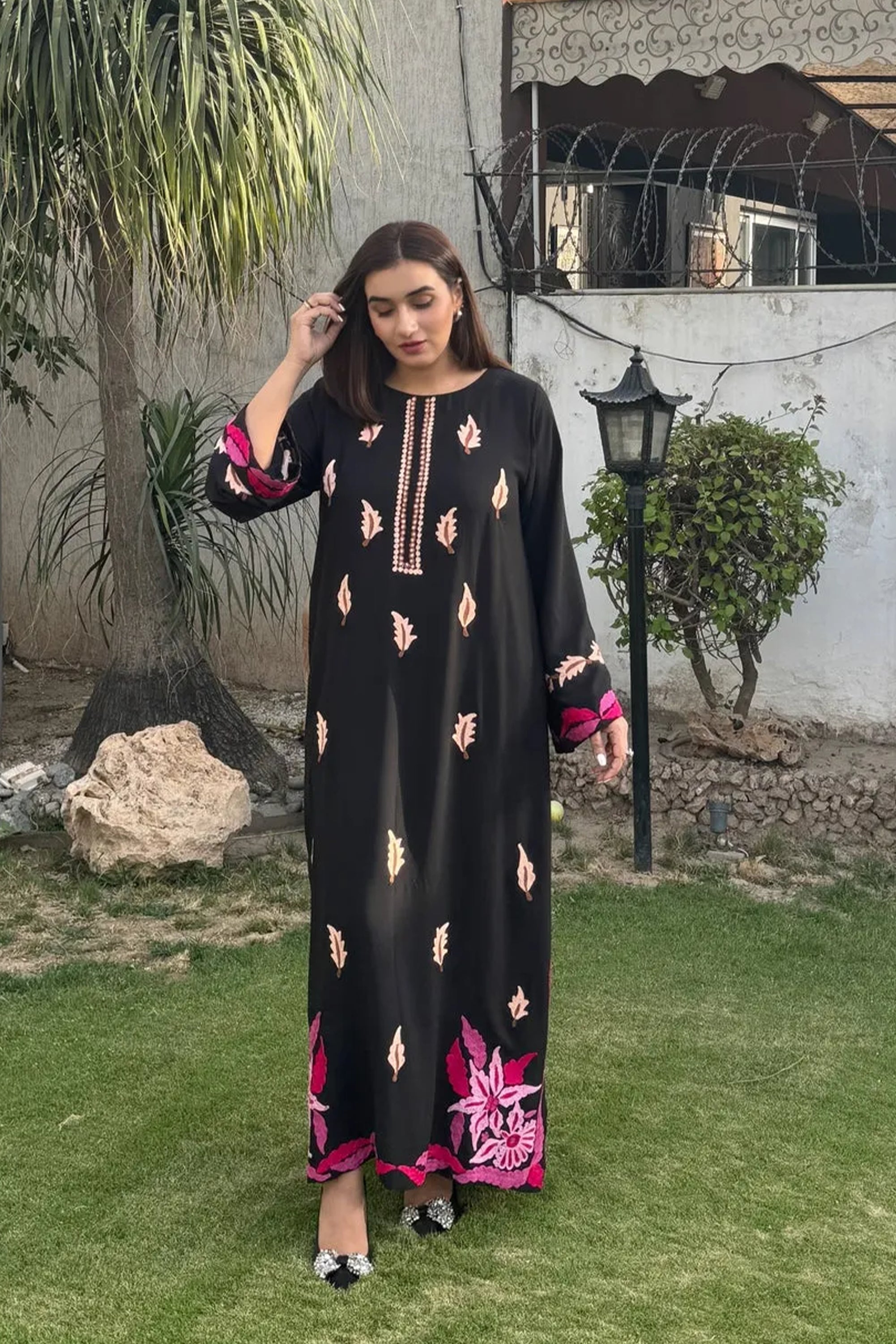 woman posing in black dress shirt look buraqstore with threaded embroidery