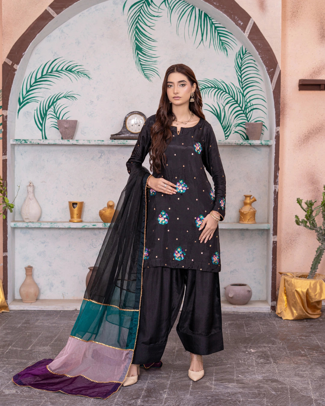 girl posing in black silk dress buraqstore with smooth fabric styling