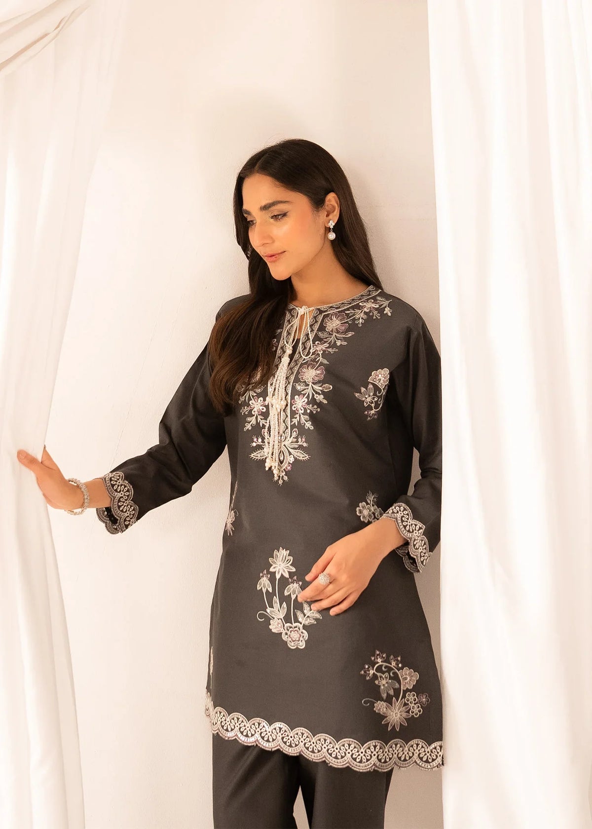 Women wearing grey colour dress, close-up of the embroidery on the lawn shirt, Buraqstore