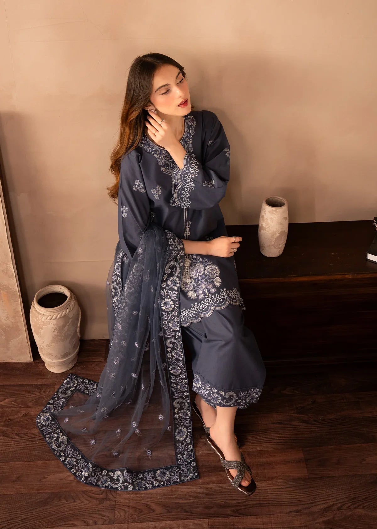 Women wearing grey colour dress, net dupatta draped over the shoulder, Buraqstore