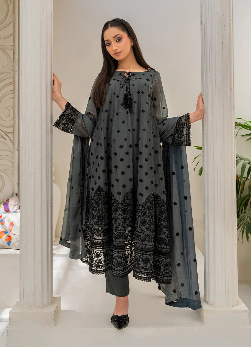 Model wearing grey colour dress design, side view showing the flow of the chiffon 3-piece set, Buraqstore