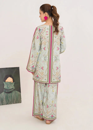 Women wearing grey silk co ord set in a relaxed standing pose, printed silk 2-piece at Buraqstore