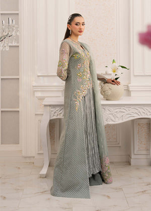 Model showcasing a grey Jamnii Russian raw silk 3 piece maxi at Buraq Store