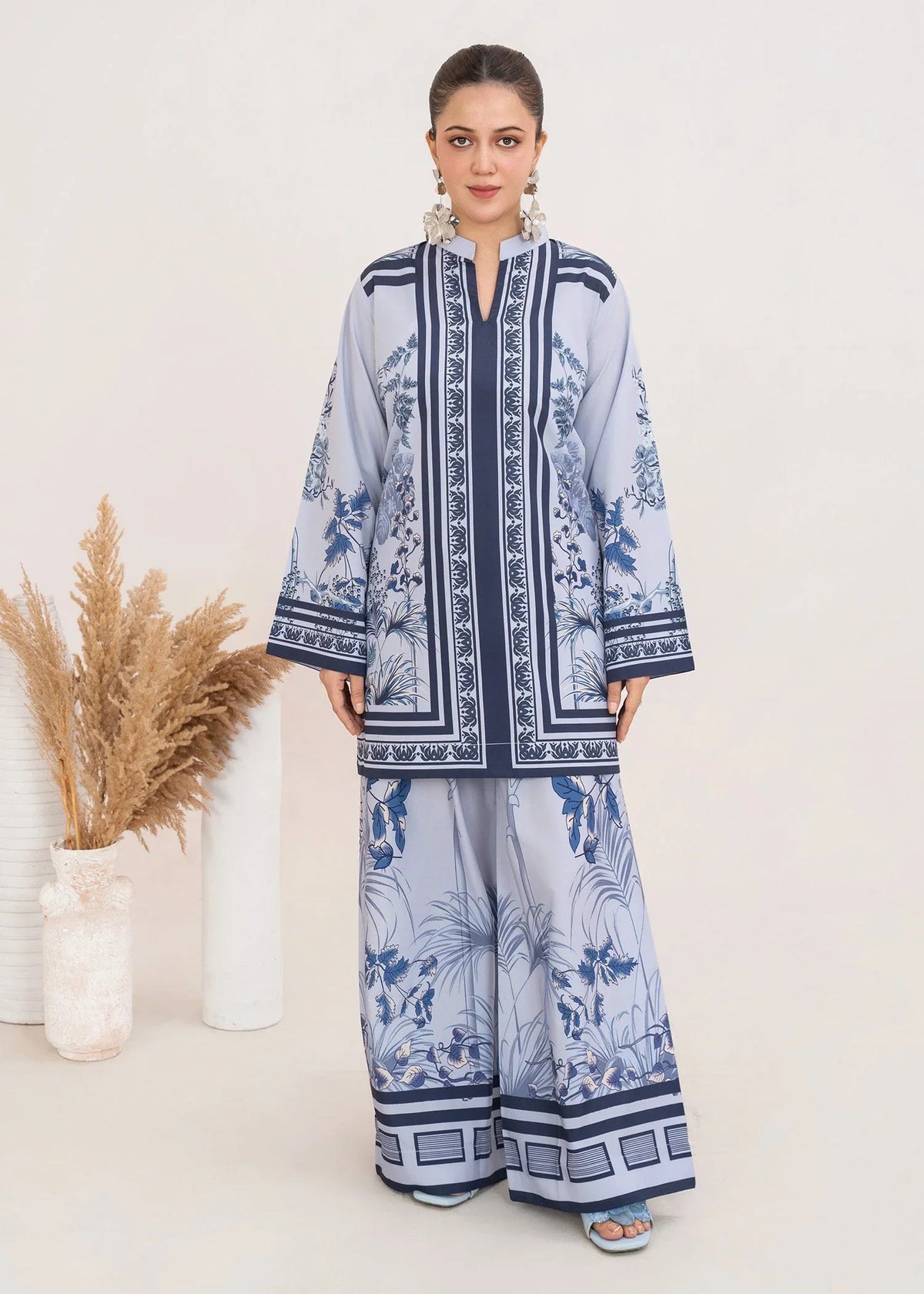 Model wearing ice blue color dress, printed poly lawn 2PC set, front view from Buraqstore
