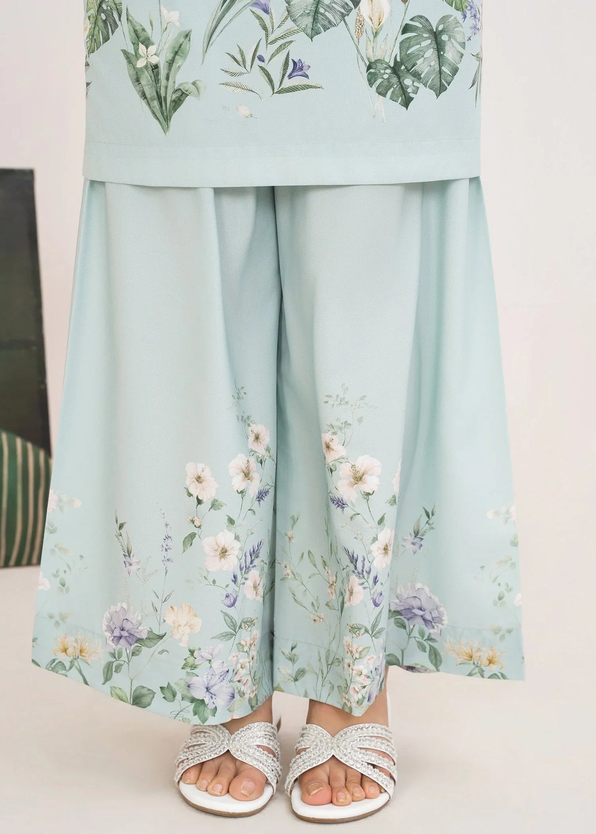 Model wearing ice blue summer co ord sets Pakistan, side view showing the fit of the printed poly lawn set, Buraqstore