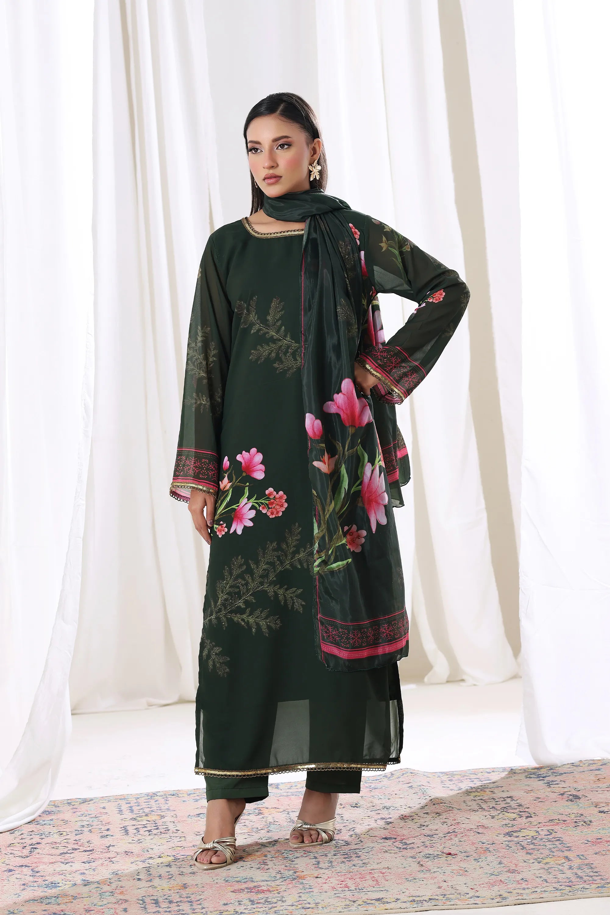 Model wearing Emerald Blossom chiffon pret from Buraqstore, elegant women’s dress in Pakistan