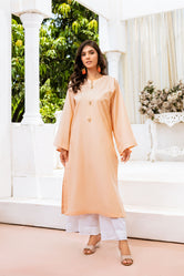 Woman wearing Buraq Store winter lawn collection sale for women Pakistan Warm Whisper pret