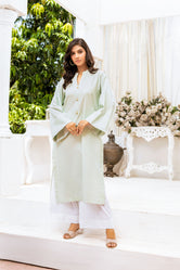 Woman wearing Buraq Store winter lawn collection sale for women online Cool Crush