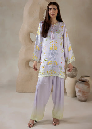 Model wearing co ord set for women in lavender, a printed charmeuse silk top and bottom, front view from Buraqstore