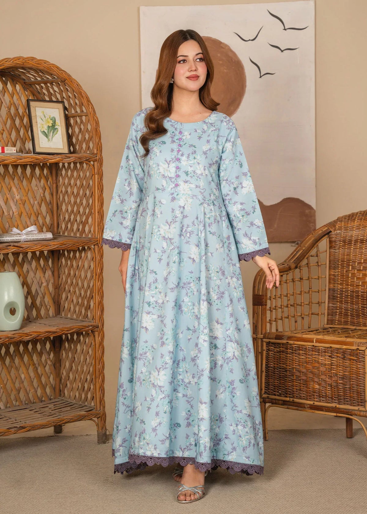 Model wearing light blue color dress, printed poly lawn 1PC, front view from Buraqstore