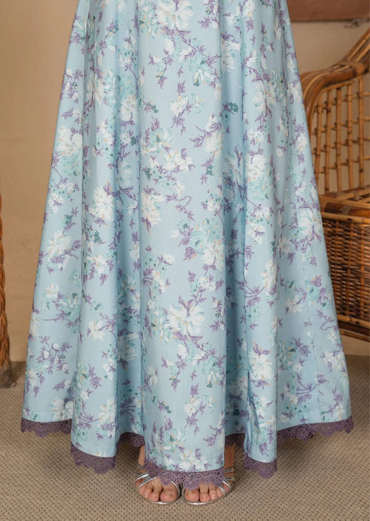 Model wearing light blue color dress, side view showing the fit of the printed poly lawn 1PC, Buraqstore