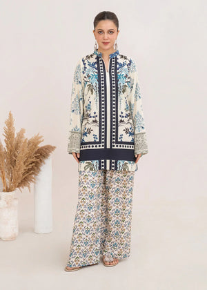 Model wearing light blue dress in light blue and white, printed grip 2PC set, front view from Buraqstore