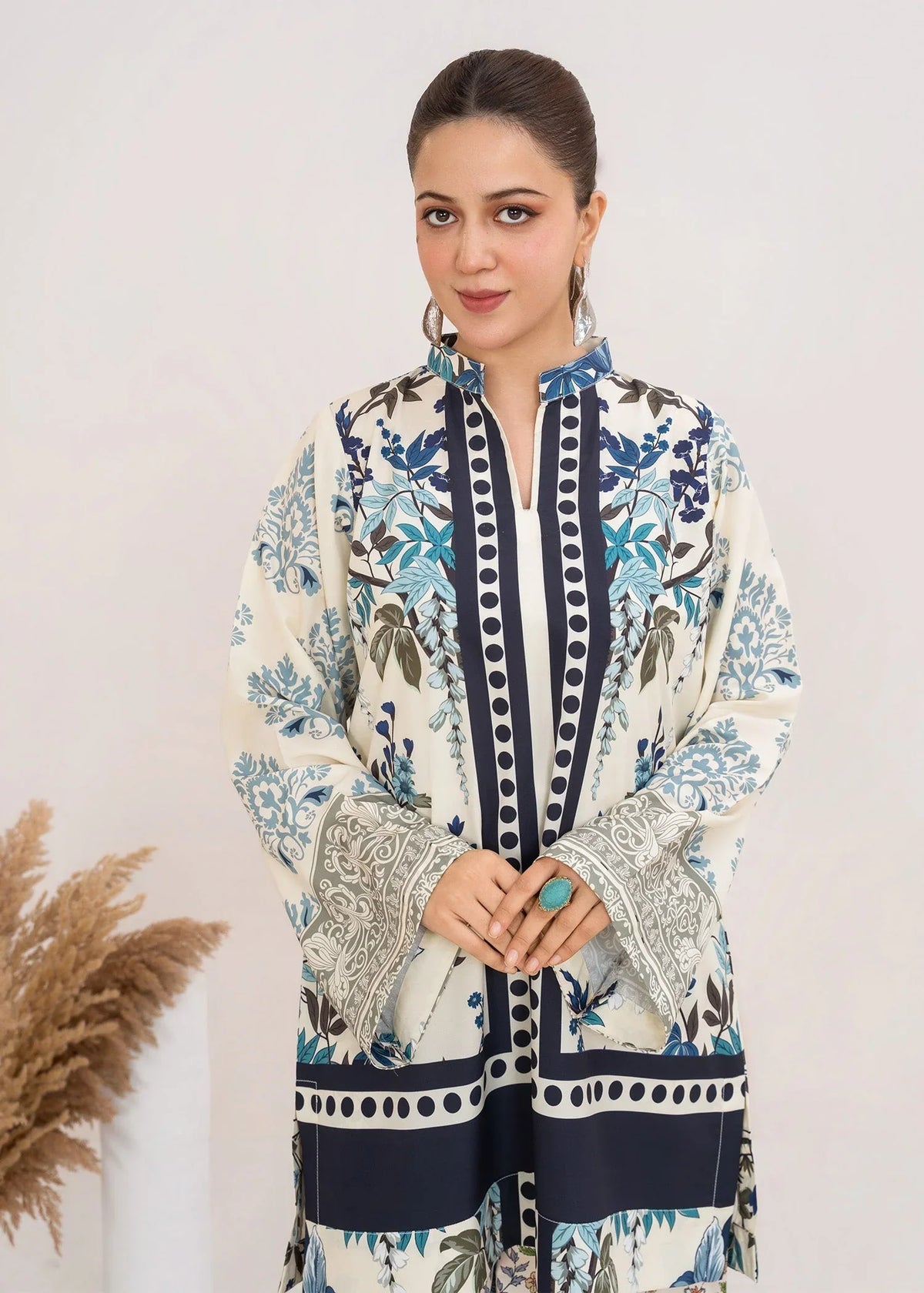 Model wearing light blue dress, side view showing the fit of the printed grip 2PC, Buraqstore