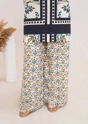Women wearing light blue dress, back view of the printed grip shirt and trouser, Buraqstore