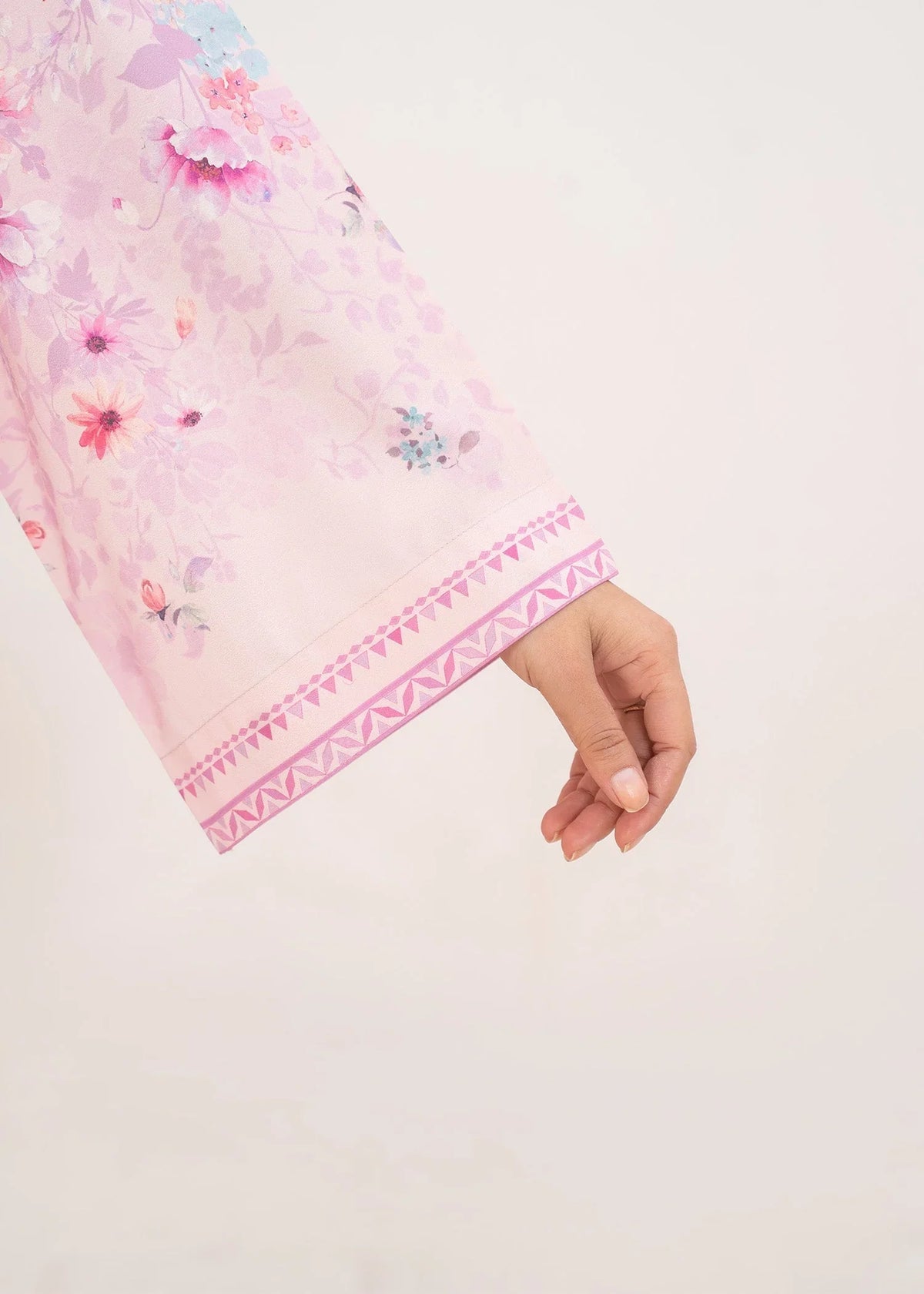 Model wearing pink color dress pakistani set as a casual outfit, shop printed poly lawn 2PC set at Buraqstore