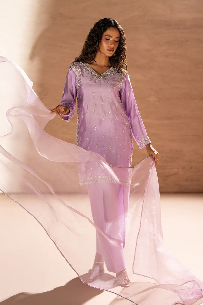 Women wearing lilac sheesha silk shirt, close-up of silver embroidery, panel detailing and sequins embellishment, Buraqstore