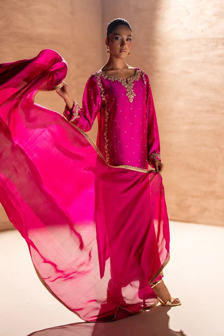 Model wearing magenta pink sheesha silk suit with matching sheesha silk trouser, side view of the 3PC set at Buraqstore