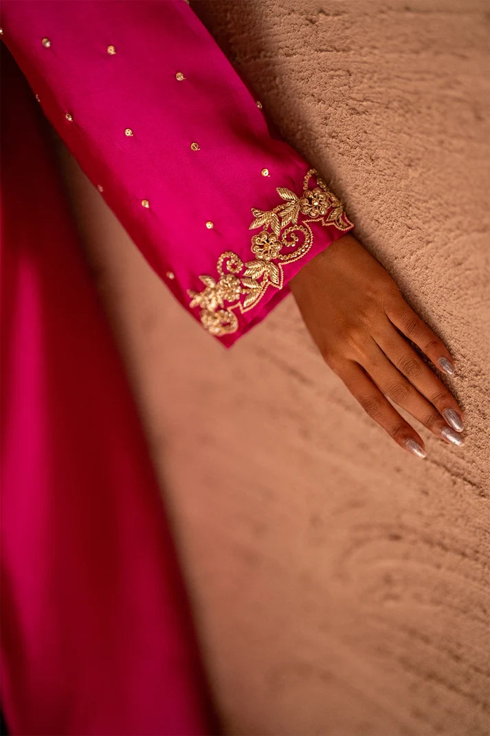 Women wearing magenta pink sheesha silk suit with a matching silk dupatta finished with delicate gold lace, Buraqstore