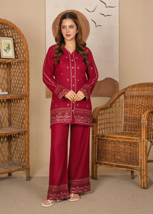 Model wearing maroon color dress, embroidered lawn 2PC set, front view from Buraqstore
