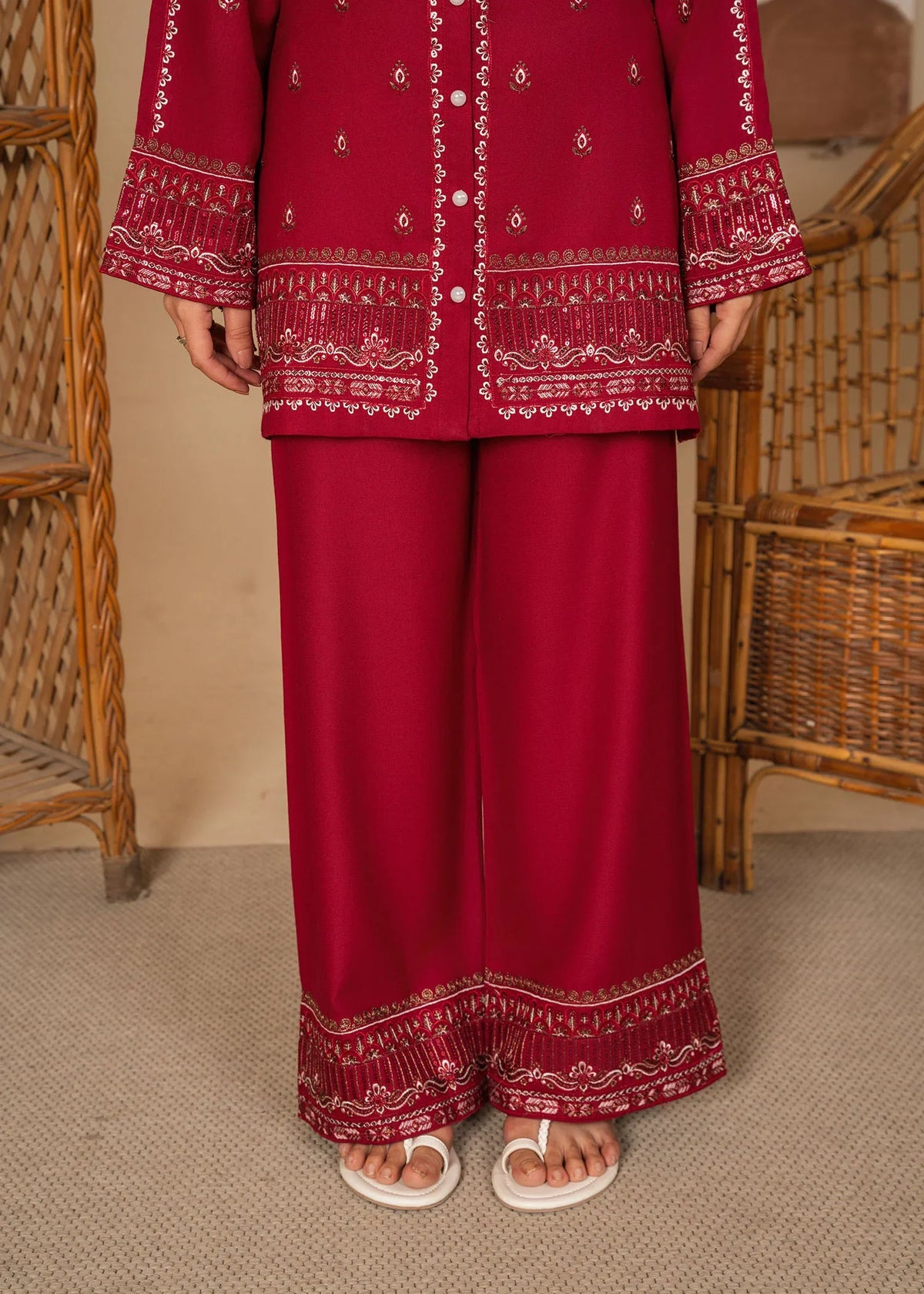 Women wearing maroon color dress, back view of the embroidered lawn shirt and trouser, Buraqstore