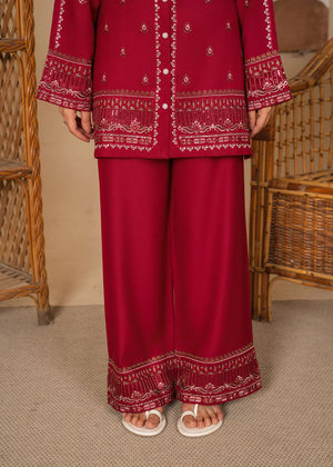 Women wearing maroon color dress, back view of the embroidered lawn shirt and trouser, Buraqstore