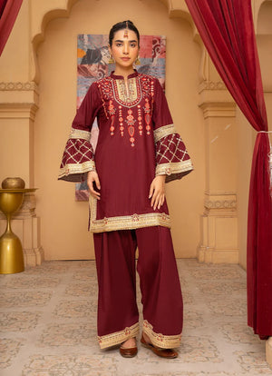 Model wearing maroon dress for women, embroidered bana dora fabric shirt and bottom, front view from Buraqstore