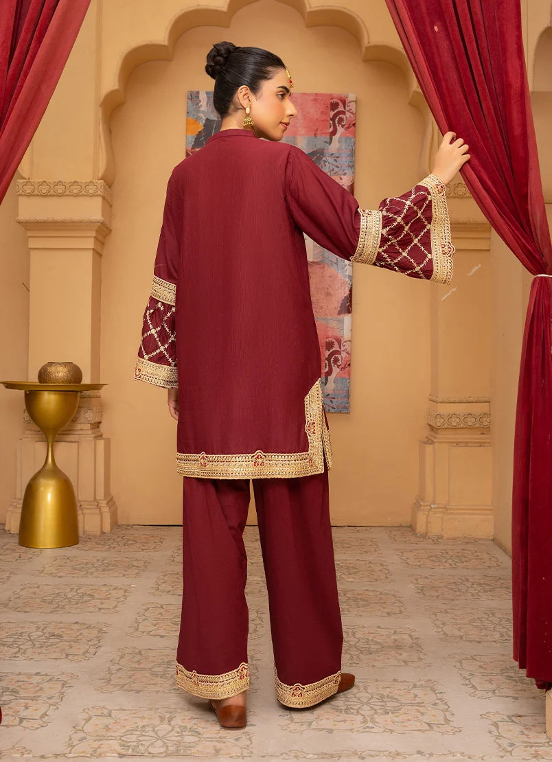 Women wearing maroon dress for women, close-up of the embroidery on the bana dora fabric, Buraqstore
