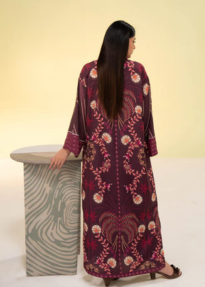 Girl wearing stylish maroon kaftan dress Pakistan by buraqstore