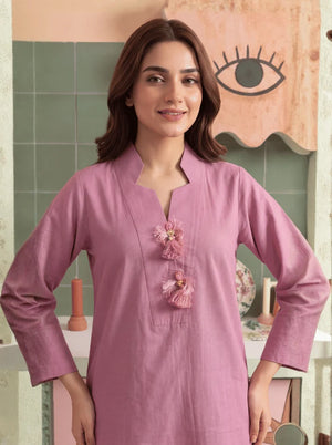 Women wearing mauve color dress, close-up of the solid dyed cambric fabric texture, Buraqstore