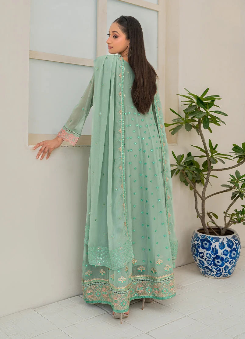 Women wearing light green color dress, close-up of the embroidery on the chiffon shirt, Buraqstore