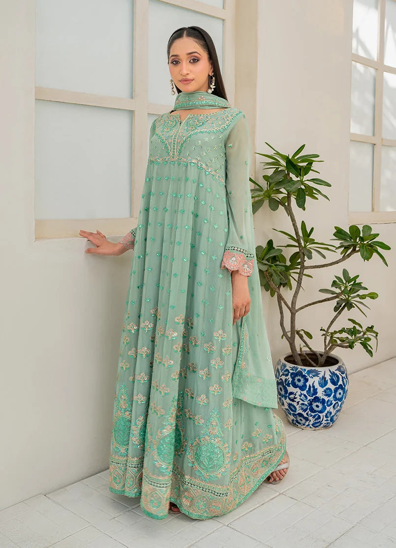 Model wearing light green color dress, side view showing the flow of the chiffon 3-piece set, Buraqstore