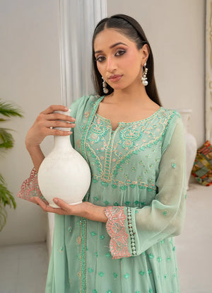 Women wearing light green color dress, chiffon dupatta draped over the shoulder, Buraqstore