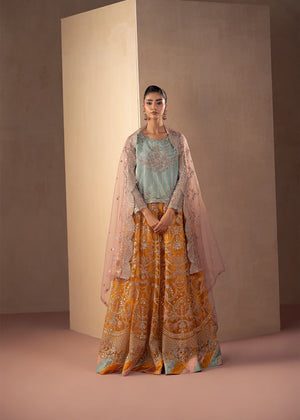Model wearing multi color dress, an embroidered and embellished shirt with sharara, front view from Buraqstore