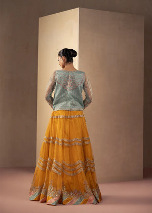 Woman wearing multi color dress, close-up of the embroidery and embellishment on the shirt, Buraqstore