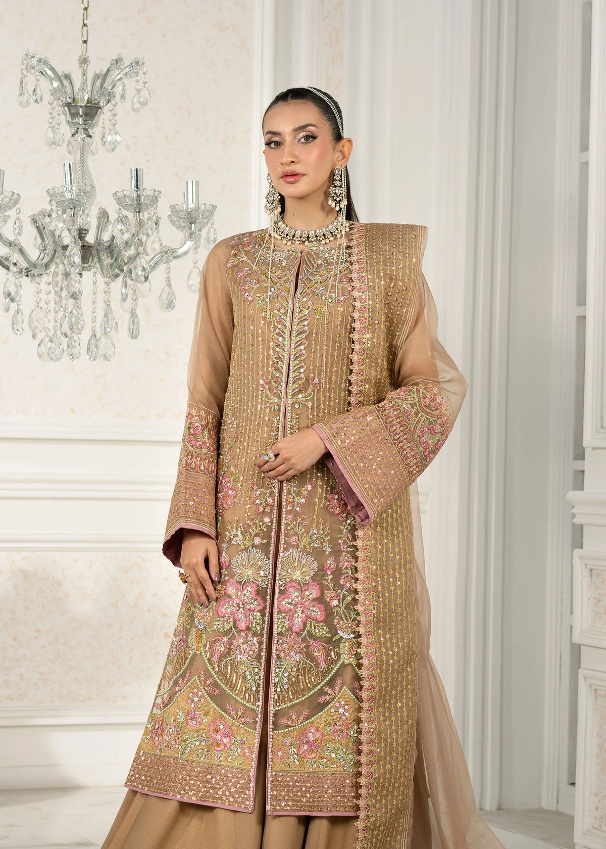 Model showcasing a mustard Jamnii organza pret outfit at Buraq Store