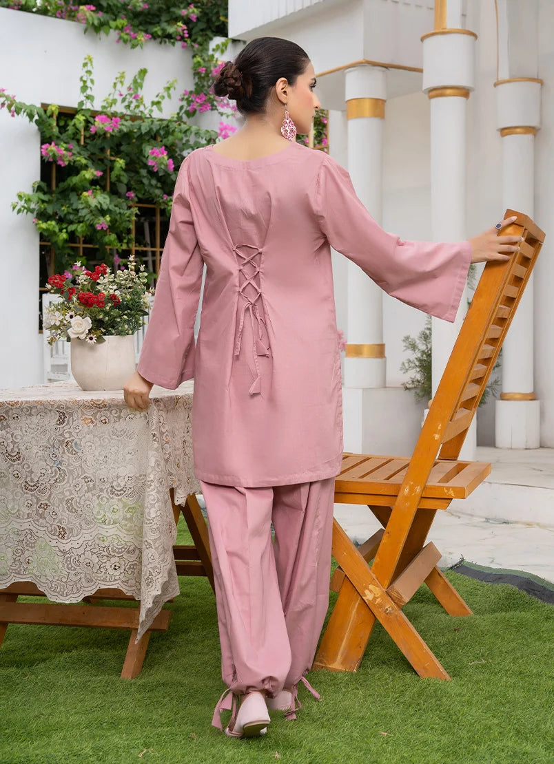 Women wearing mauve color dress, close-up of the cotton fabric texture, Buraqstore