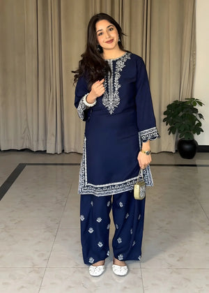Women wearing navy blue dress, back view of the embroidered lawn shirt and trouser, Buraqstore