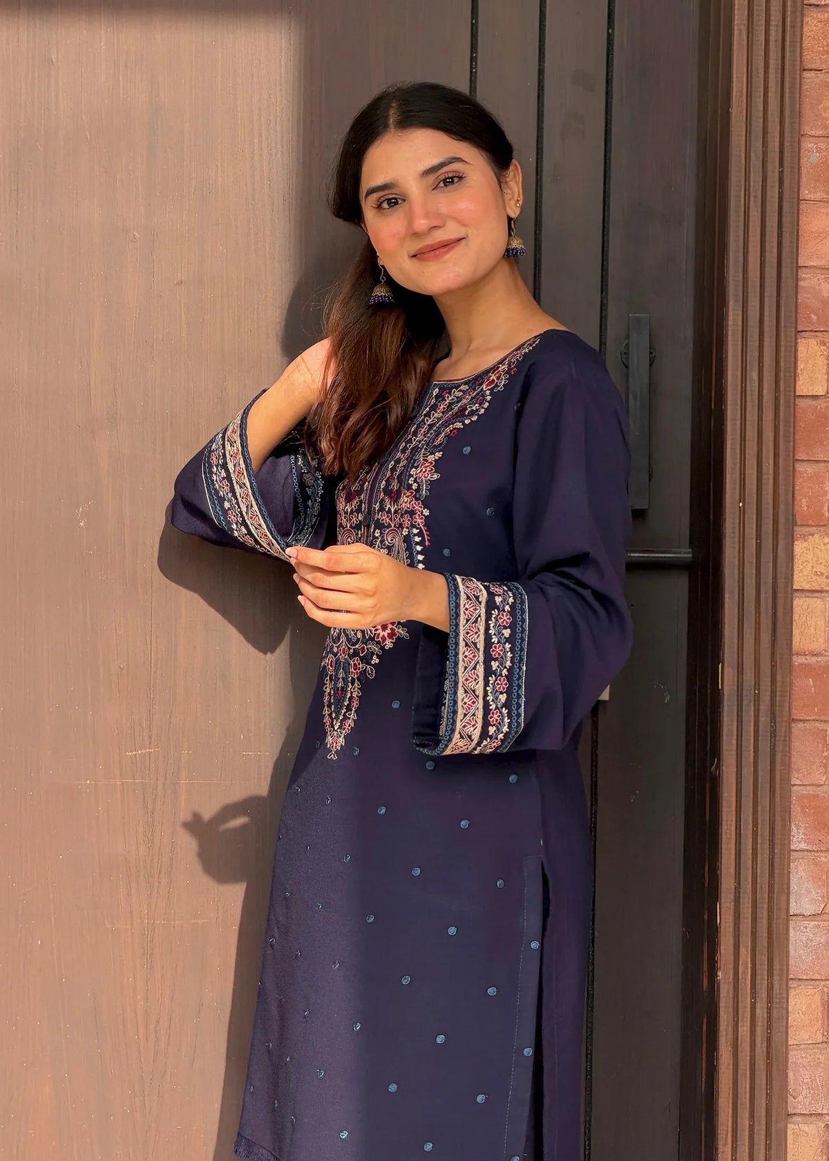 Women wearing navy blue dress pakistani, back view of the embroidered viscose shirt and trouser, Buraqstore