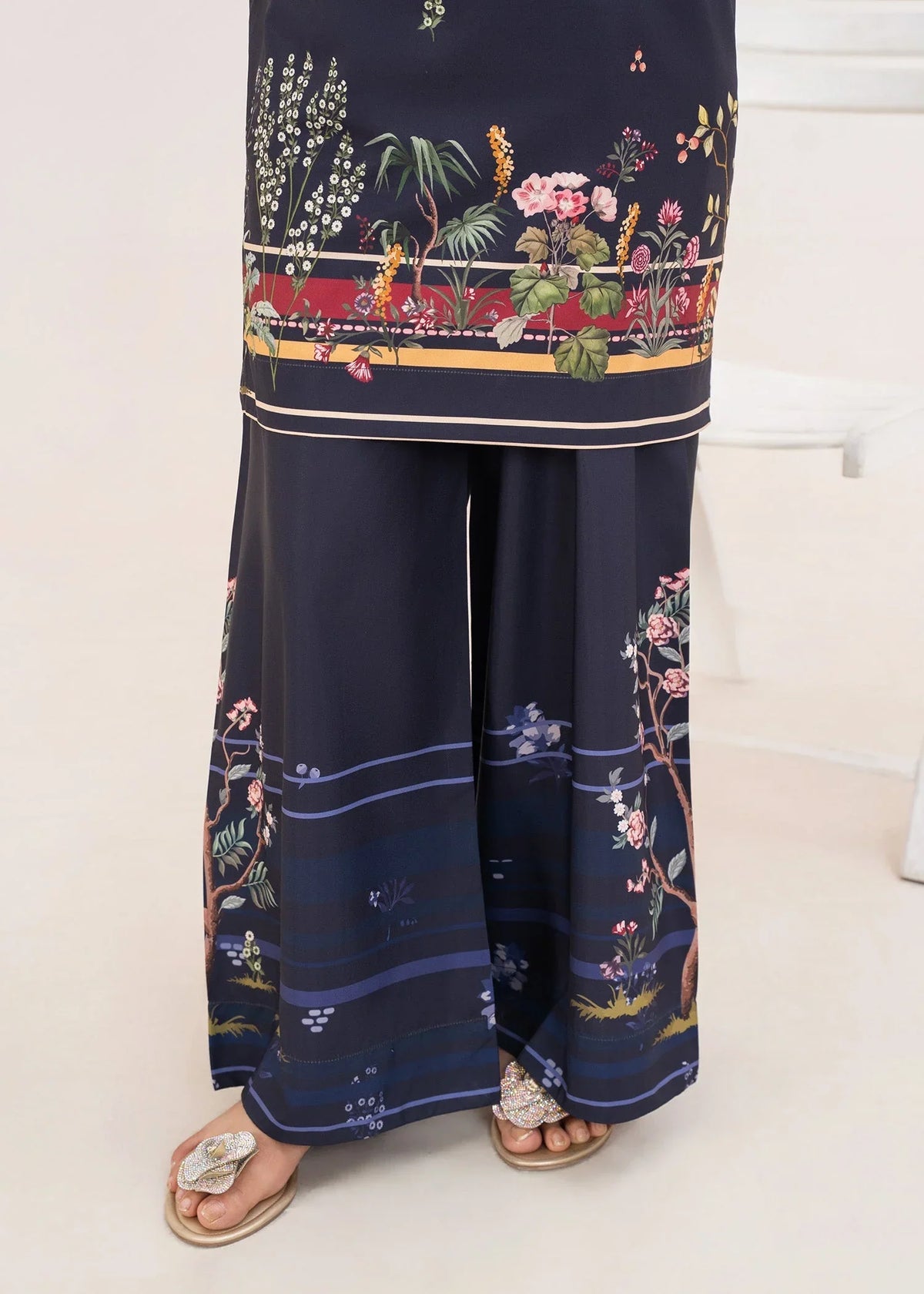 Women wearing navy blue lawn co ord set for women, side view showing the fit of the printed poly lawn set, Buraqstore