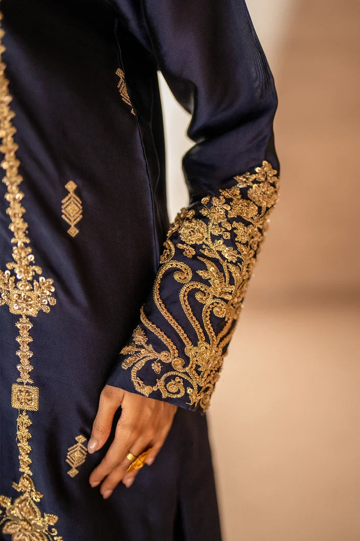 Model wearing navy blue sheesha silk dress price in pakistan set as a festive outfit, shop 3PC silk set at Buraqstore