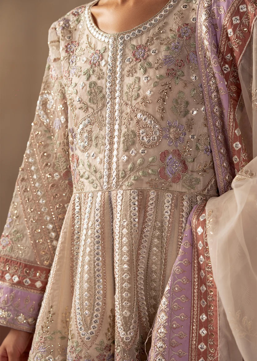 Women wearing off white dress, organza dupatta draped over the shoulder, Buraqstore
