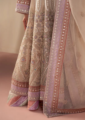 Model wearing off white dress as an elegant outfit, shop the embroidered maxi 2-piece set at Buraqstore