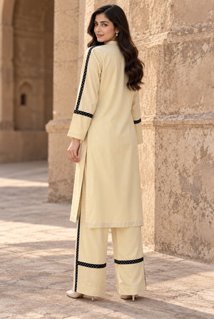 Model wearing off-white linen dress design 2PC in a relaxed standing pose, light breathable dyed linen by Buraqstore