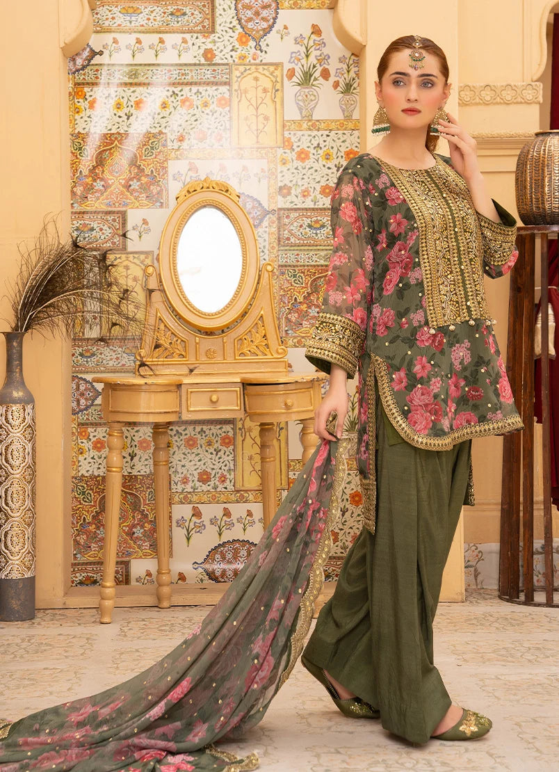 Model wearing green dress design, side view showing the fall of the silk 3-piece set, Buraqstore