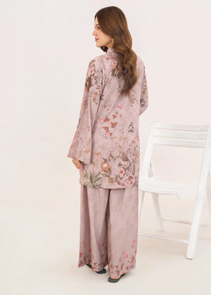 Women wearing orchid pink lawn co ord set in a relaxed standing pose, printed poly lawn 2-piece at Buraqstore