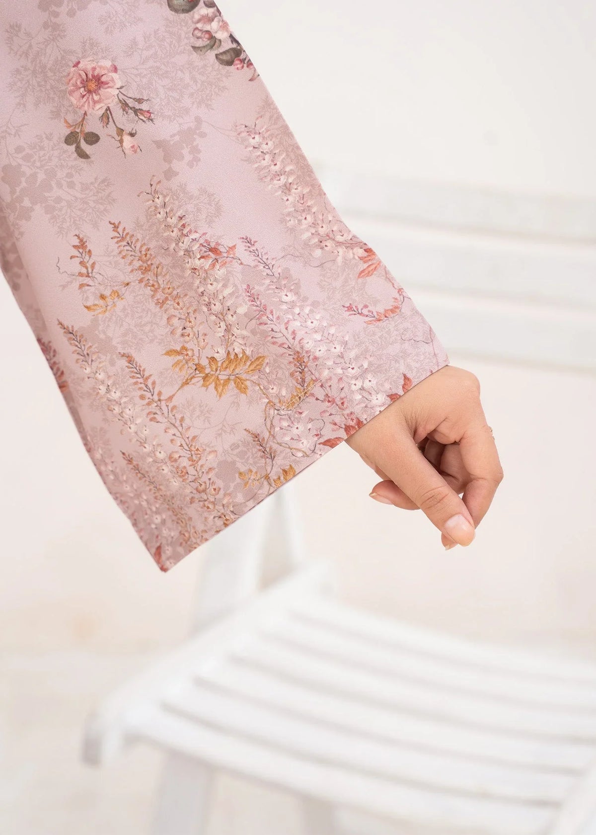 Women wearing orchid pink lawn co ord set, close-up of the print on the poly lawn top and bottom, Buraqstore