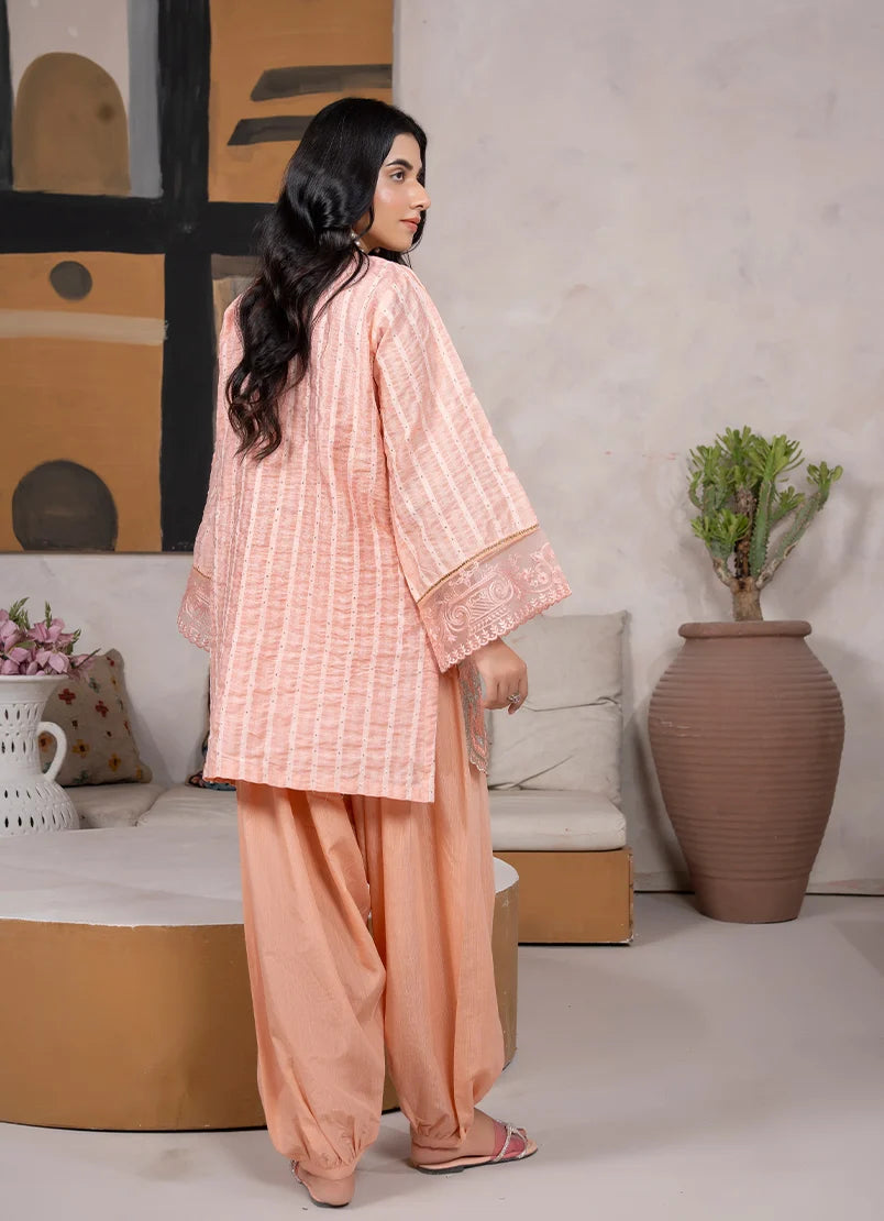Women wearing peach color dress, close-up of the embroidery on the jacquard fabric texture, Buraqstore